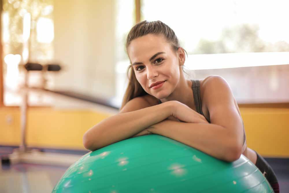 Square One - Pre & postnatal physiotherapy: Image showing woman resting on large ball 
